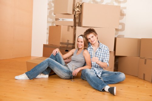 Removal van and moving team in a Pimlico residential street