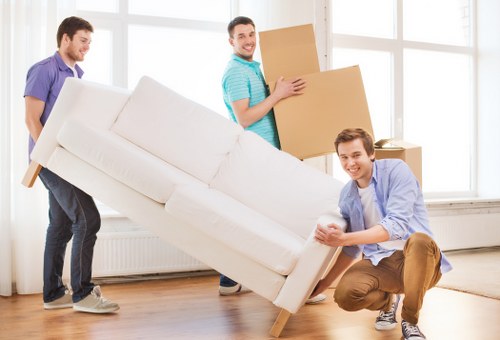 Local moving truck helping with furniture transport in central London