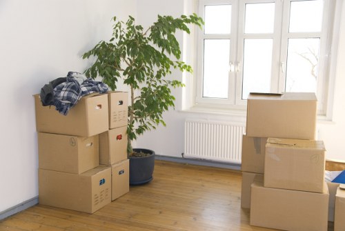 Trained removals staff handling furniture safely