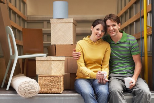 Local movers helping with boxes in a Pimlico flat
