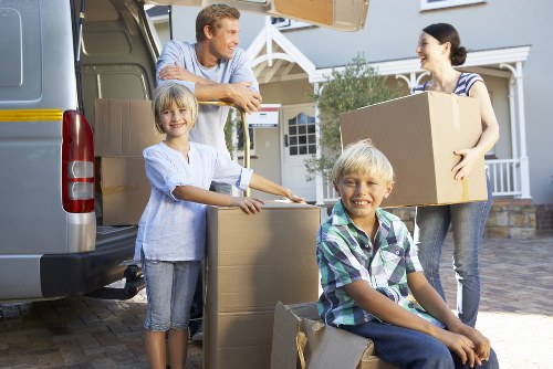 Packed office equipment and furniture ready for a business move