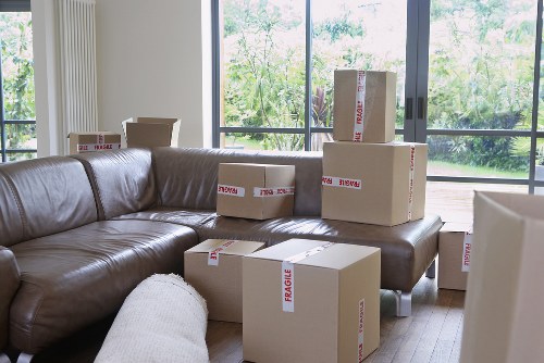 Pimlico removals staff organizing boxes and furniture for transport